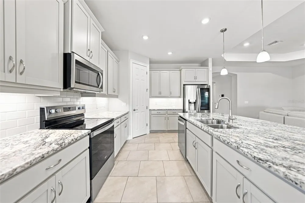 719 HEATHER LAKE AVENUE Cape Coral, FL 33993