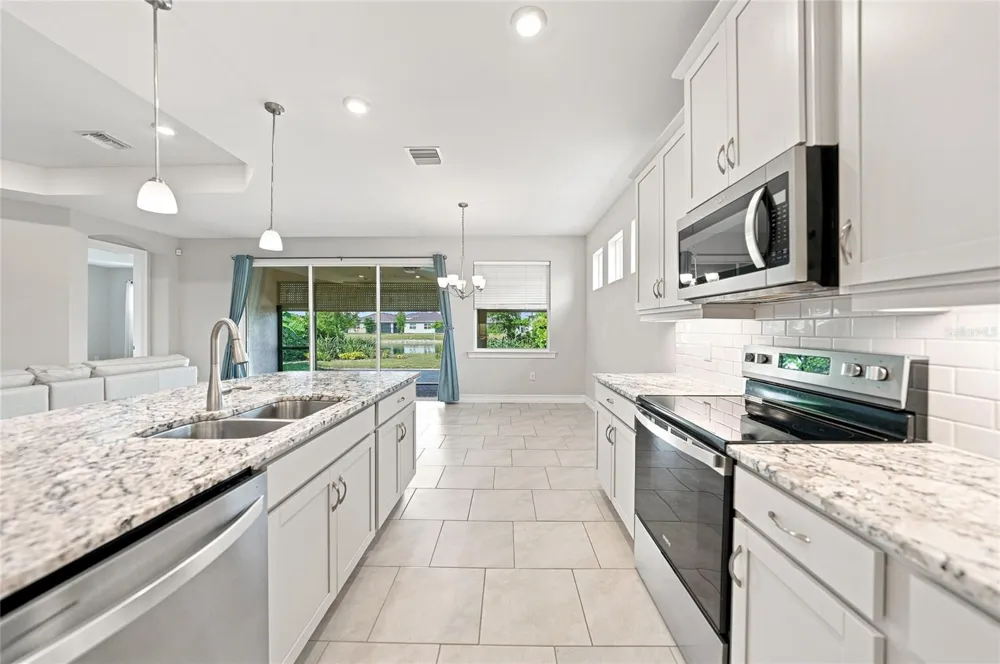 719 HEATHER LAKE AVENUE Cape Coral, FL 33993