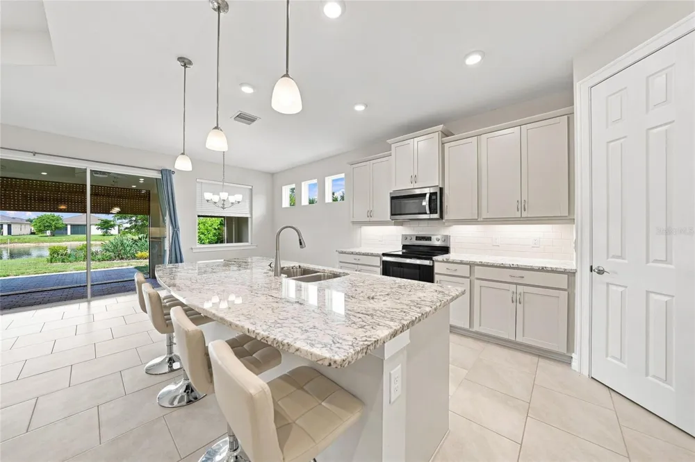 719 HEATHER LAKE AVENUE Cape Coral, FL 33993
