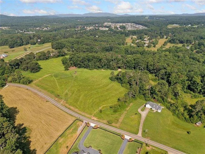 187 Long Road Ball Ground, GA 30107