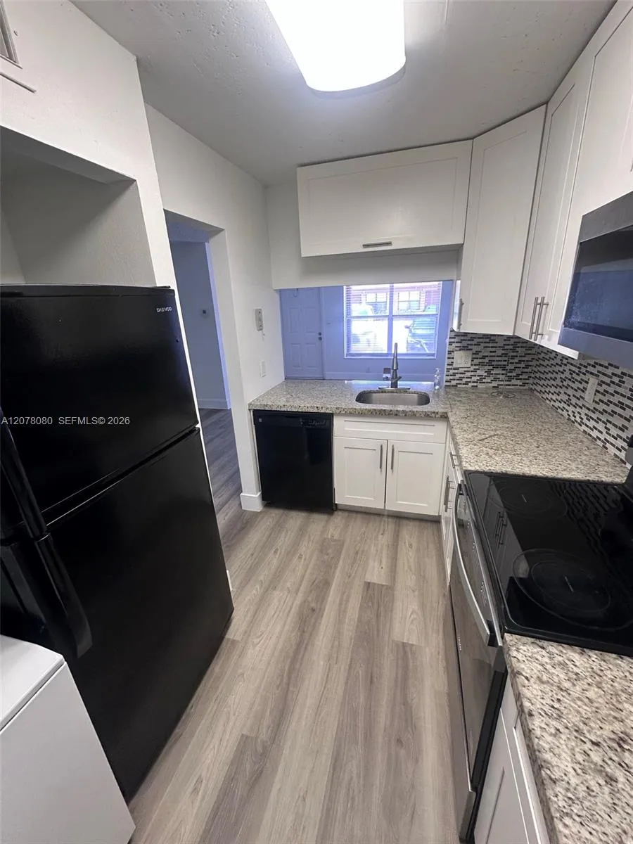 10049 Winding Lake Rd #103 Sunrise, FL 33351