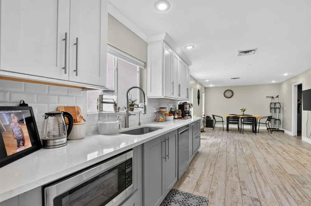 10426 BUENA VENTURA DRIVE Boca Raton, FL 33498