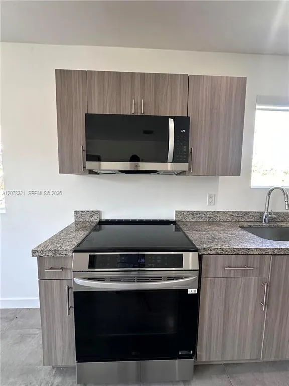 165 NW 39th St #3 Miami, FL 33127