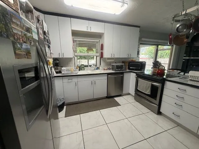 255 SANDPIPER AVENUE Royal Palm Beach, FL 33411