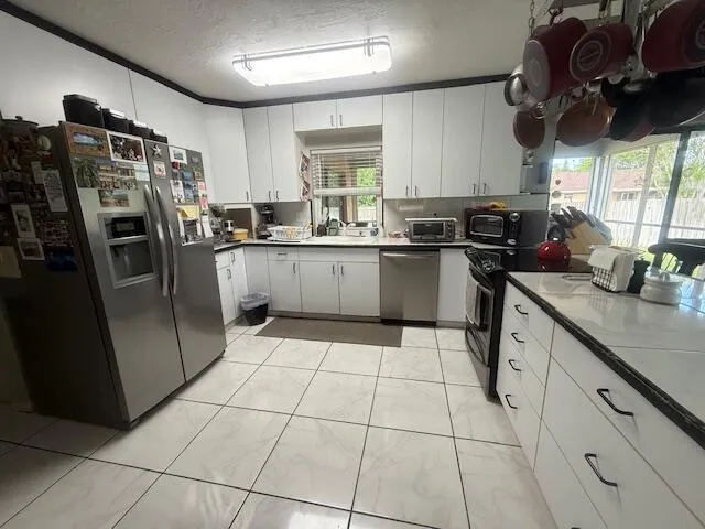 255 SANDPIPER AVENUE Royal Palm Beach, FL 33411