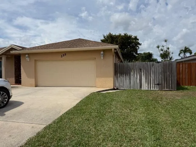 255 SANDPIPER AVENUE Royal Palm Beach, FL 33411