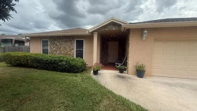 255 SANDPIPER AVENUE Royal Palm Beach, FL 33411