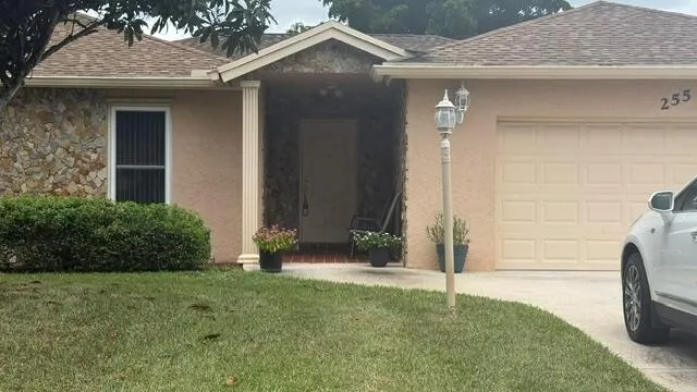 255 SANDPIPER AVENUE Royal Palm Beach, FL 33411