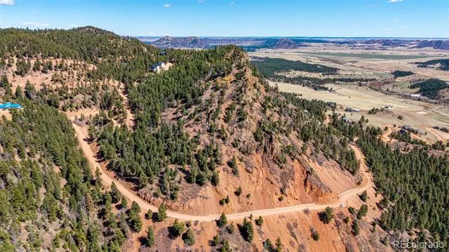 13912 Woodmoor West Drive Larkspur, CO 80118