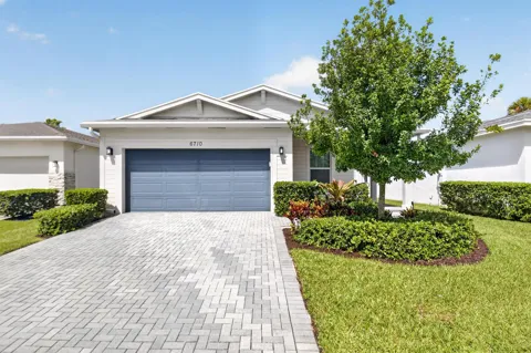 6710 POINTE OF WOODS DRIVE