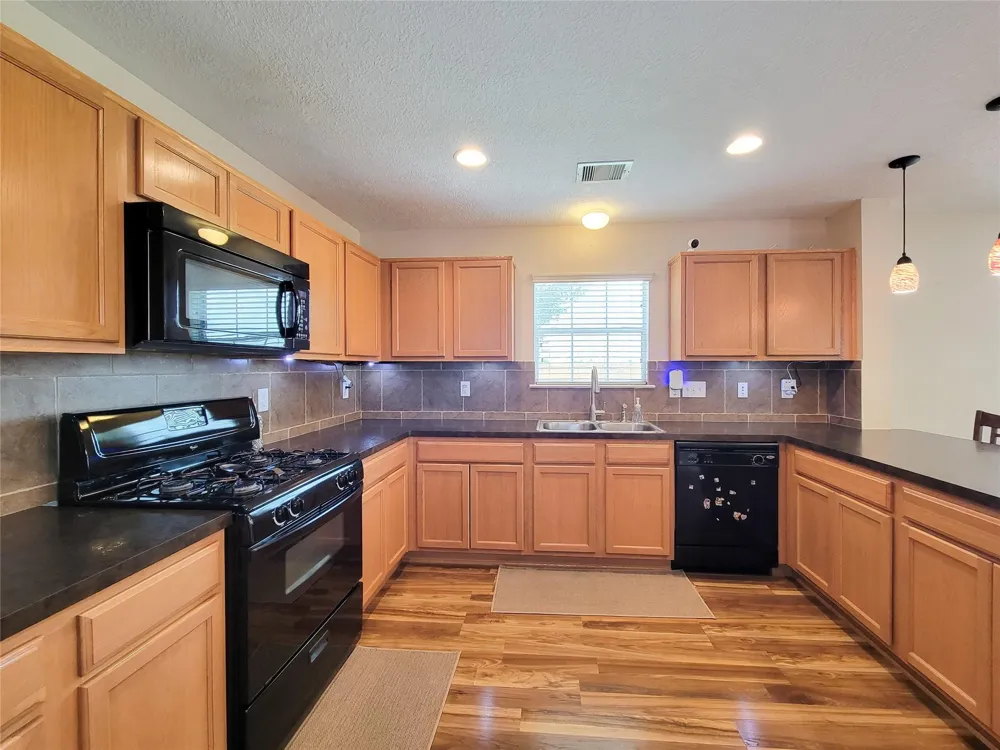 7726 Sagemark Ridge Drive Cypress, TX 77433