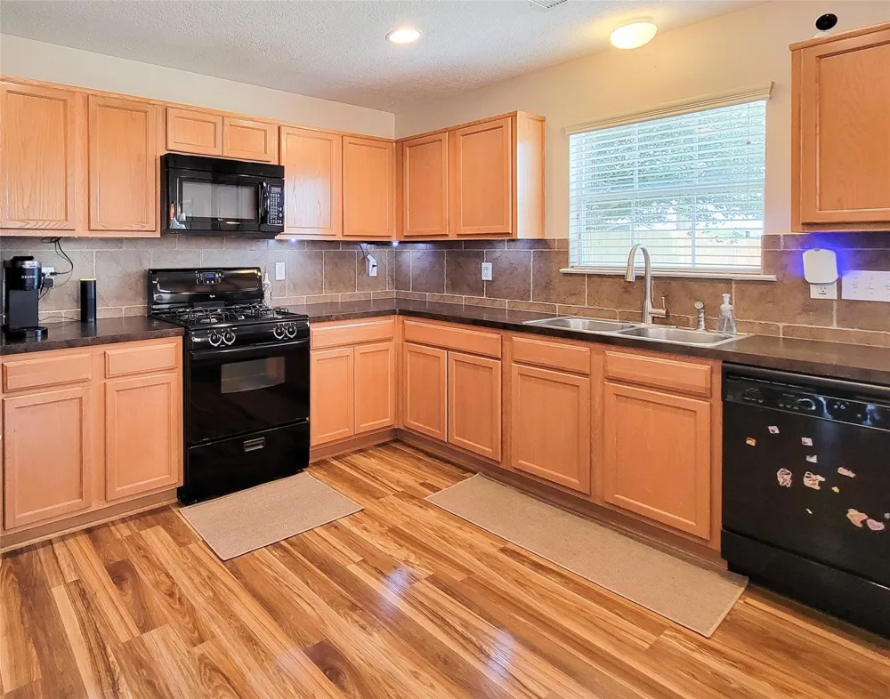 7726 Sagemark Ridge Drive Cypress, TX 77433