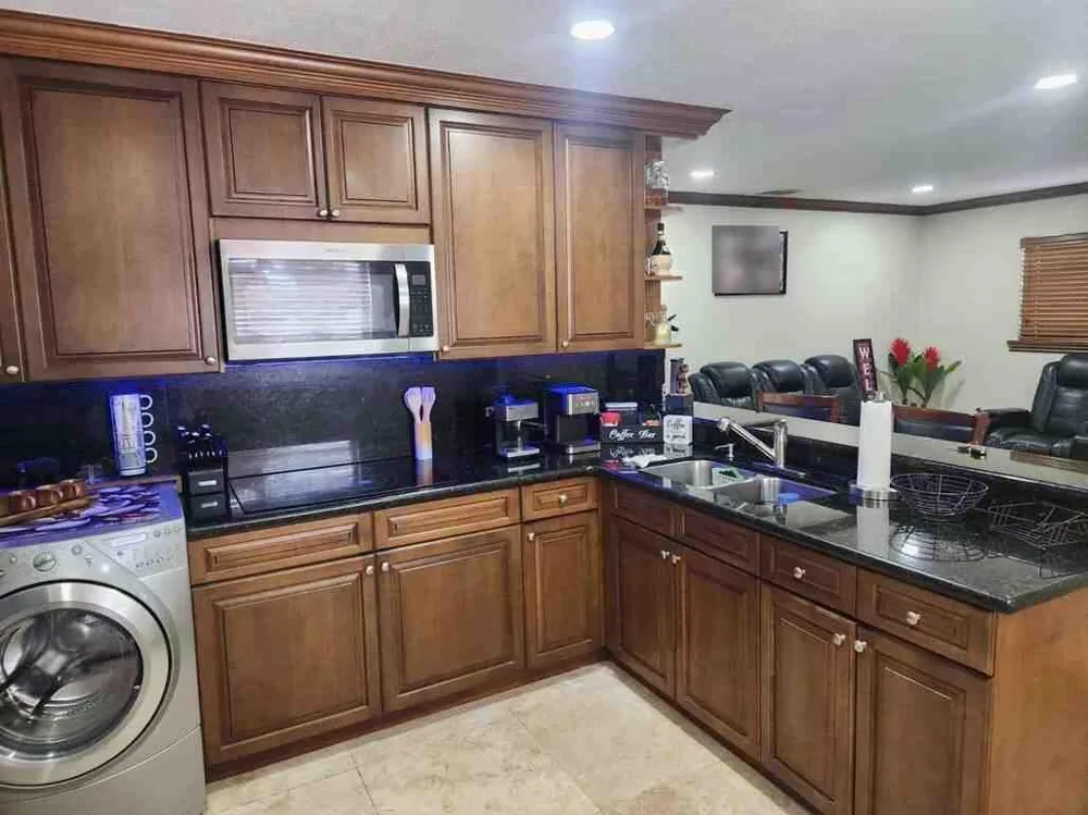 1195 NW 30TH PLACE Miami, FL 33125