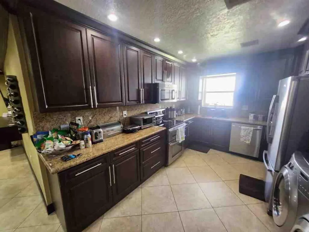 1195 NW 30TH PLACE Miami, FL 33125