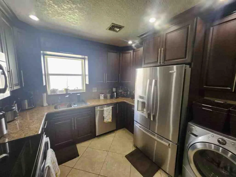 1195 NW 30TH PLACE Miami, FL 33125