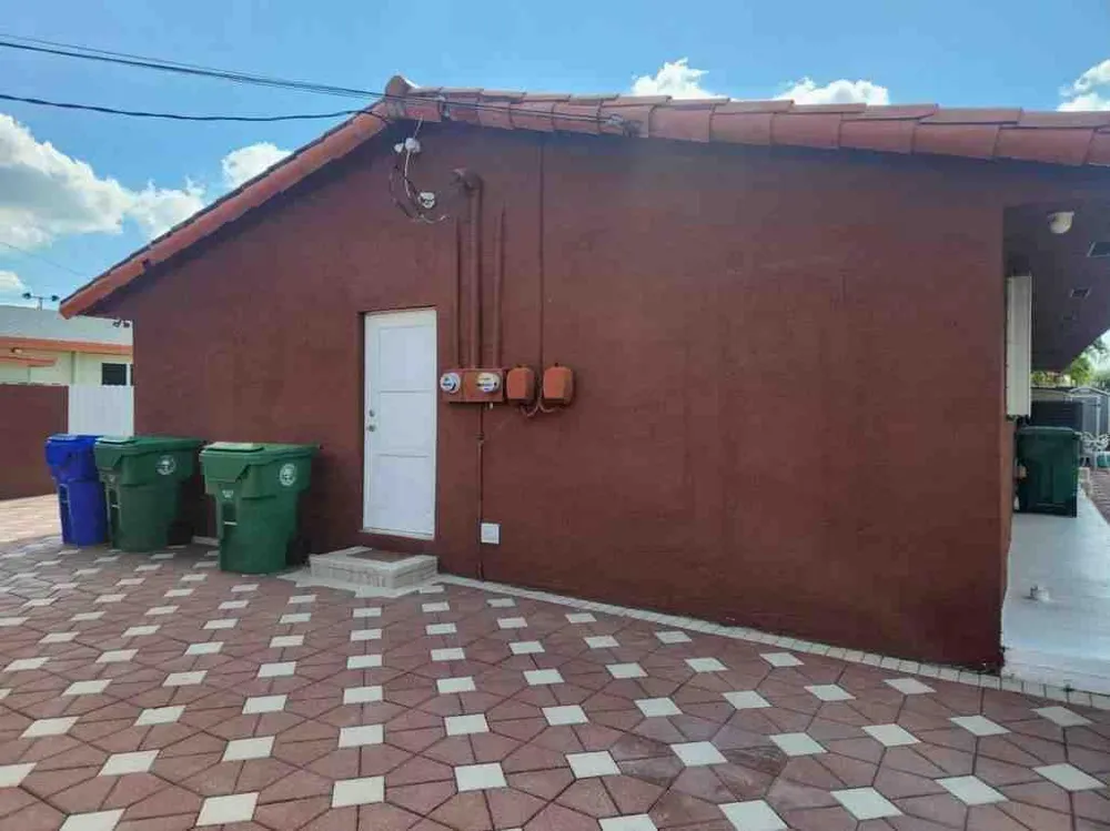 1195 NW 30TH PLACE Miami, FL 33125