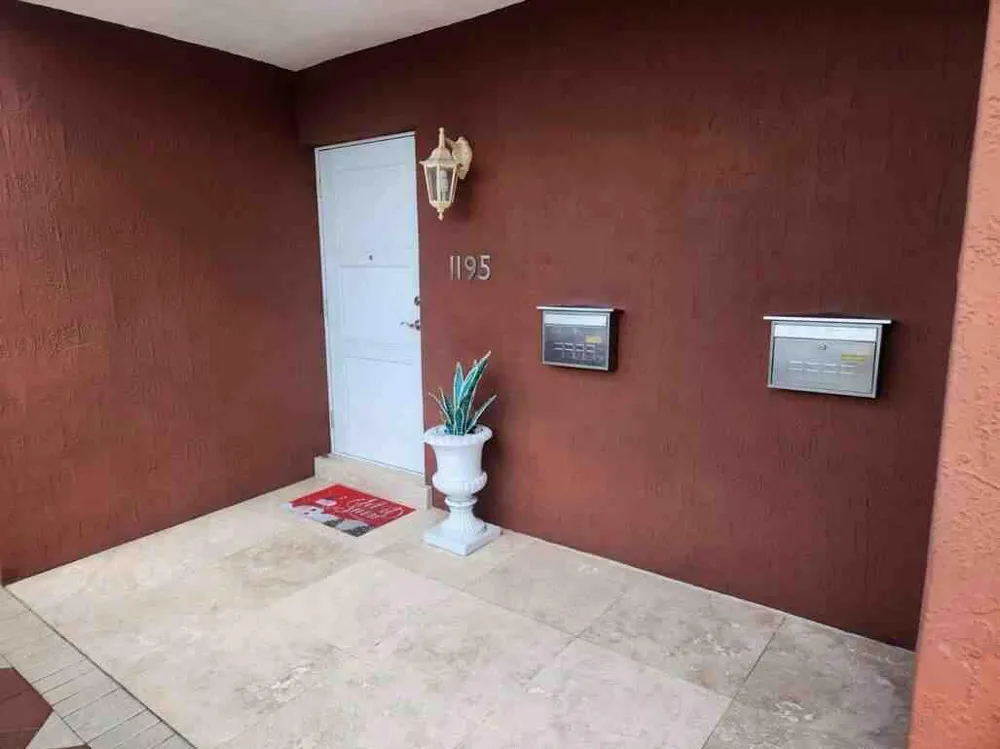 1195 NW 30TH PLACE Miami, FL 33125