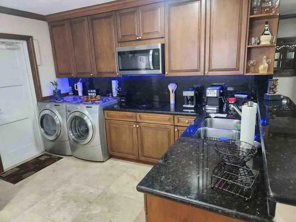 1195 NW 30TH PLACE Miami, FL 33125