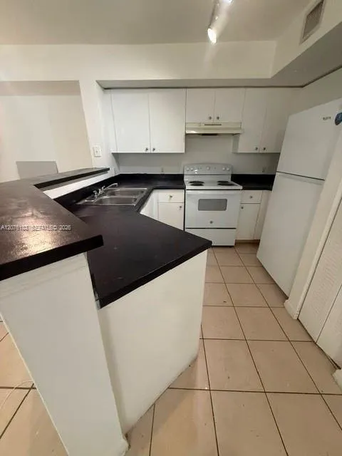 4211 San Marino #106 West Palm Beach, FL 33409