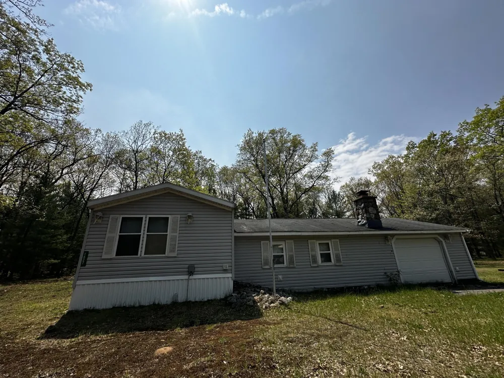 1627 W Delong Drive Peacock Township, MI 49304