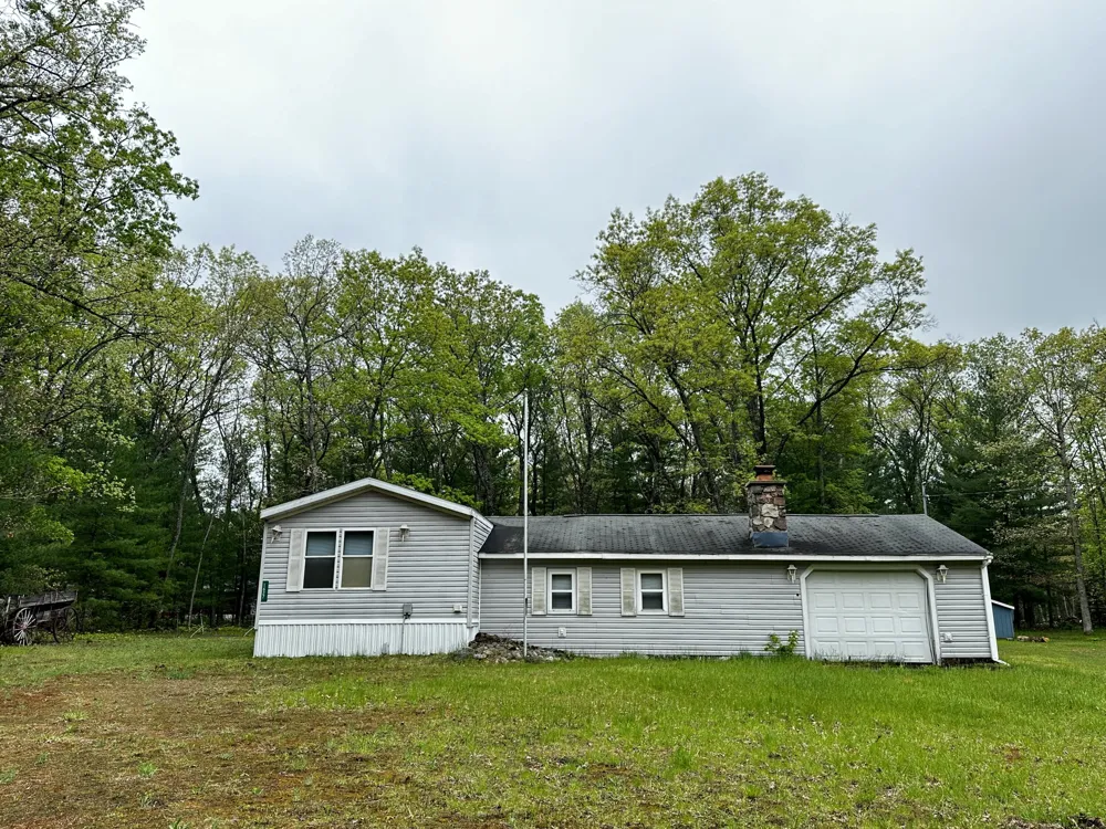 1627 W Delong Drive Peacock Township, MI 49304