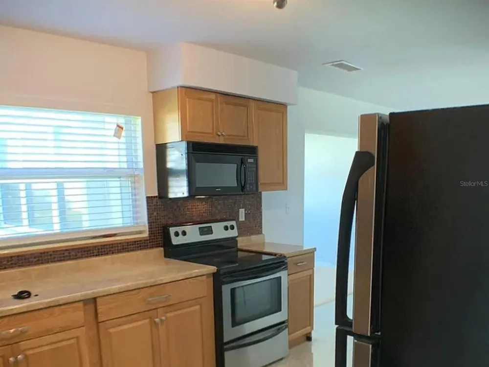 5003 58TH WAY Kenneth City, FL 33709