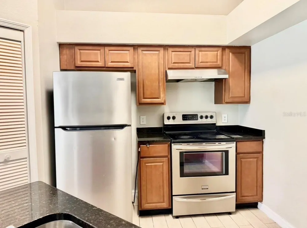 4607 GATE PLACE #202 Orlando, FL 32811