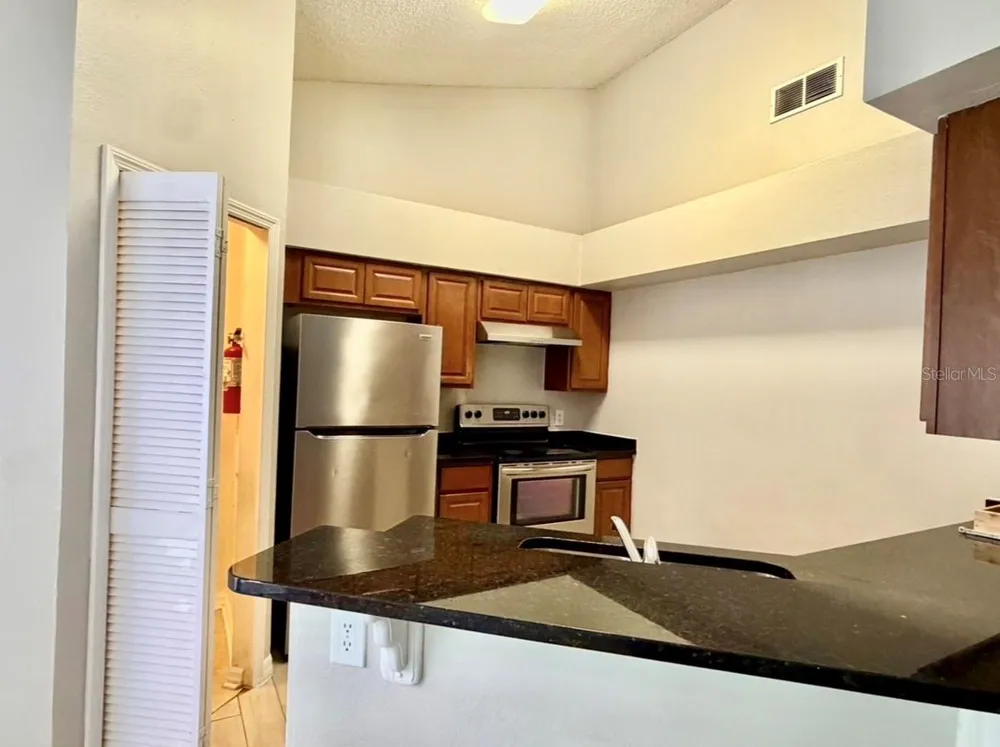 4607 GATE PLACE #202 Orlando, FL 32811