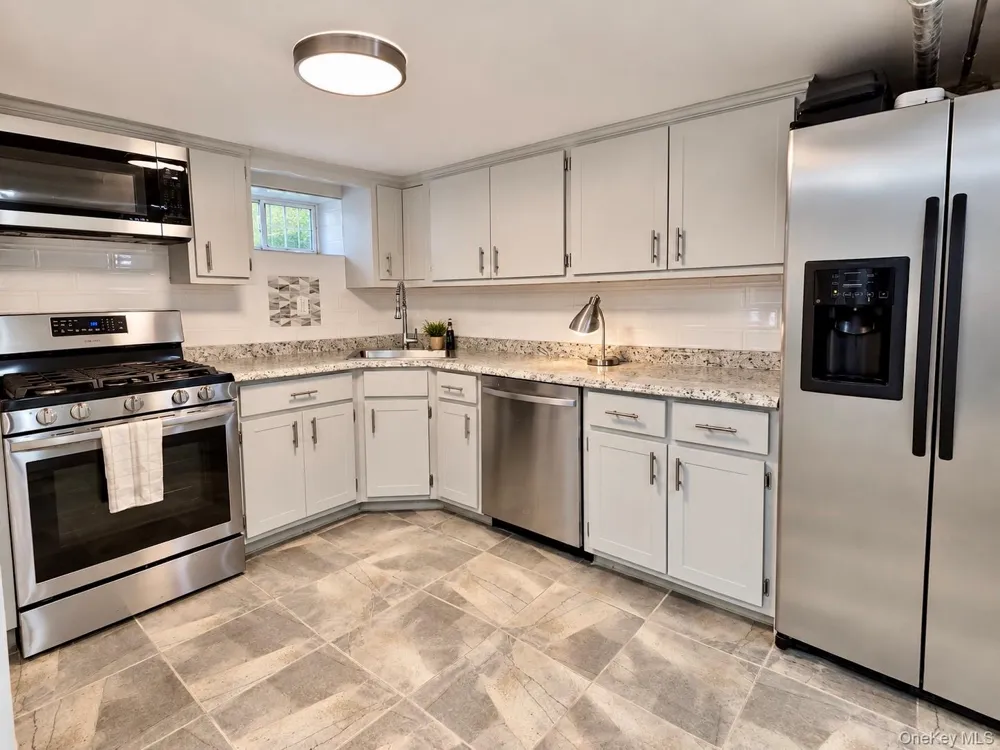 11418 238th Street Elmont, NY 11003