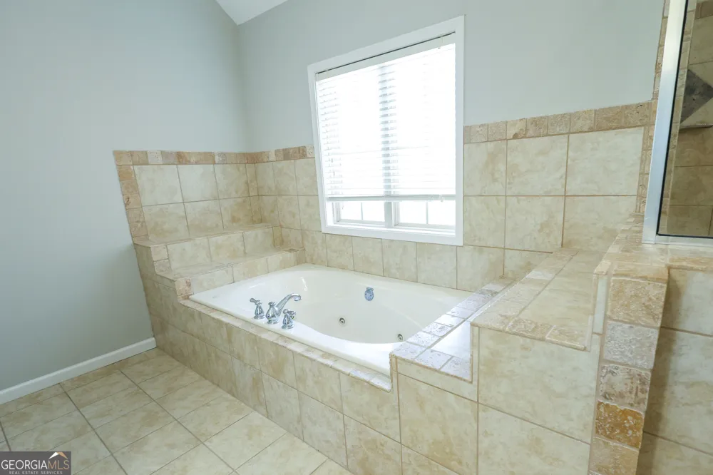 2389 Apalachee Crucis LN Dacula, GA 30019
