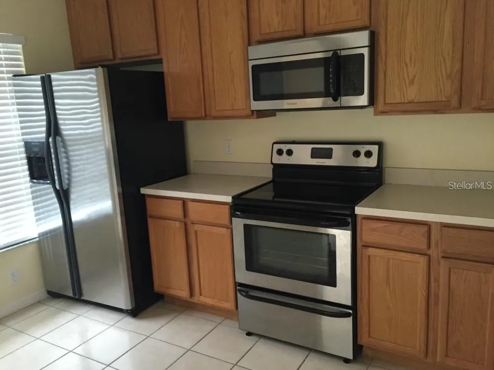 9477 FLOWERING COTTONWOOD ROAD #49 Orlando, FL 32832