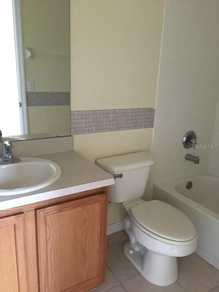 9477 FLOWERING COTTONWOOD ROAD #49 Orlando, FL 32832