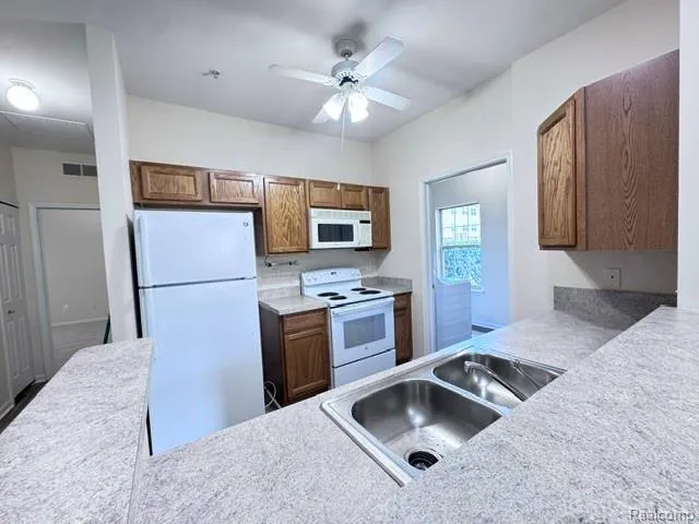 488 Village Drive Walled Lake City, MI 48390