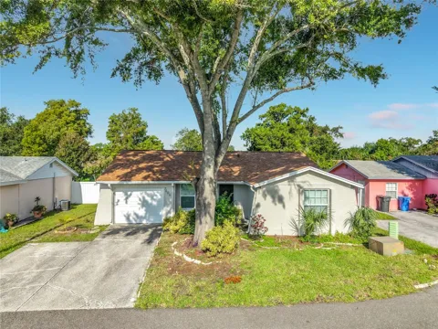 7606 WOODLAND OAKS COURT