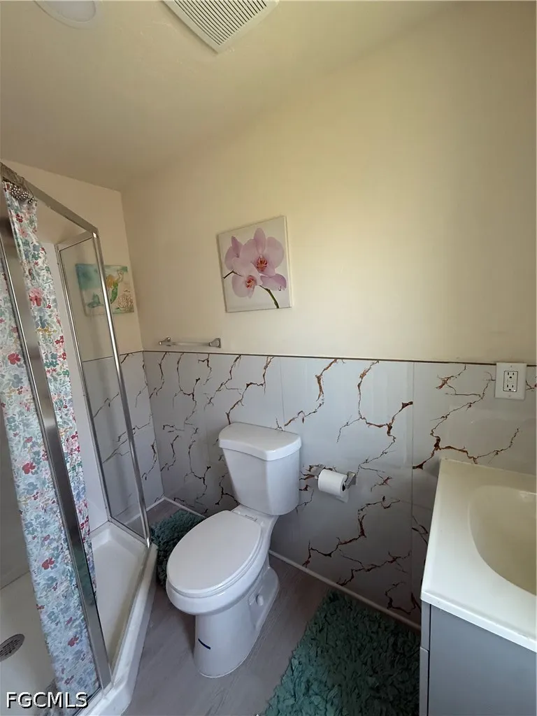 lxora Court E Naples, FL 34110