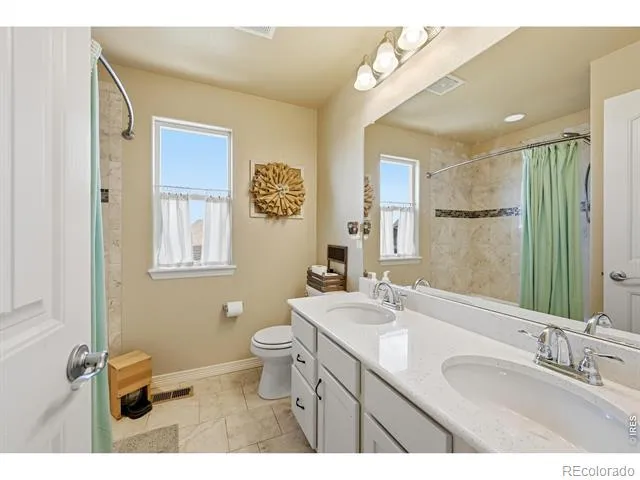 671 Vermilion Peak Drive Windsor, CO 80550