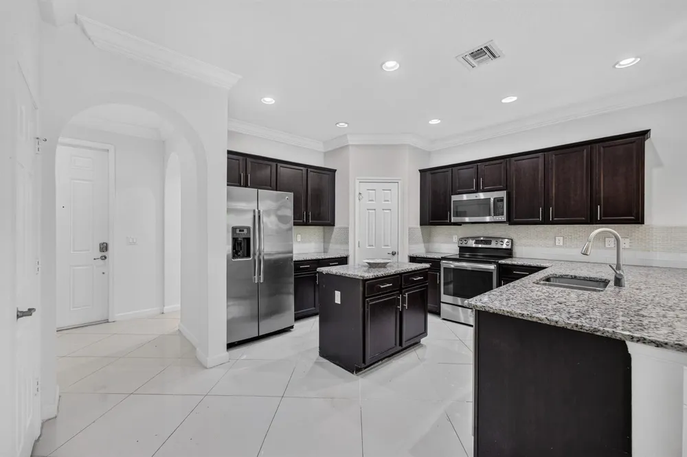 10306 WELLINGTON PARC DRIVE Wellington, FL 33449