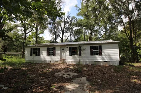 9599 NW 56TH LANE