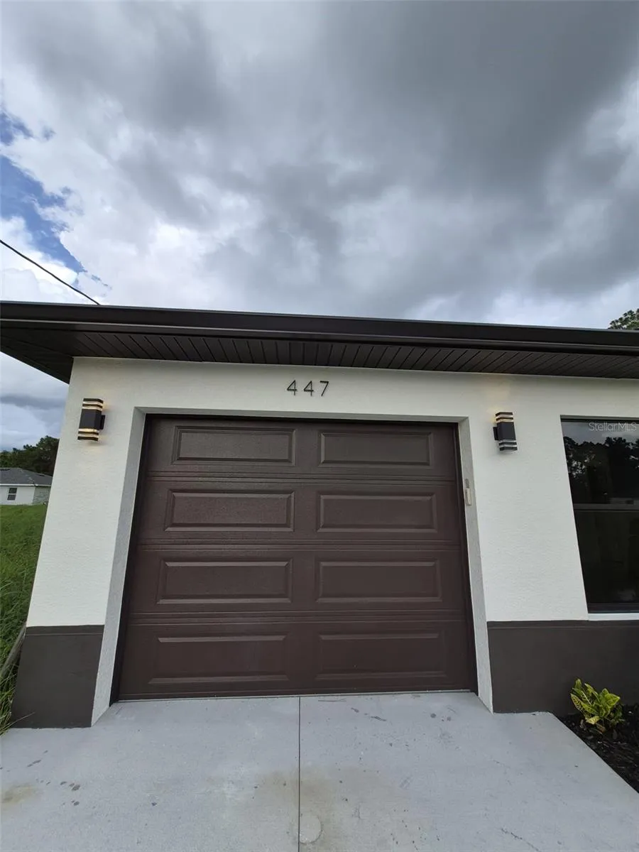 447 WICKHAM AVENUE S Lehigh Acres, FL 33974