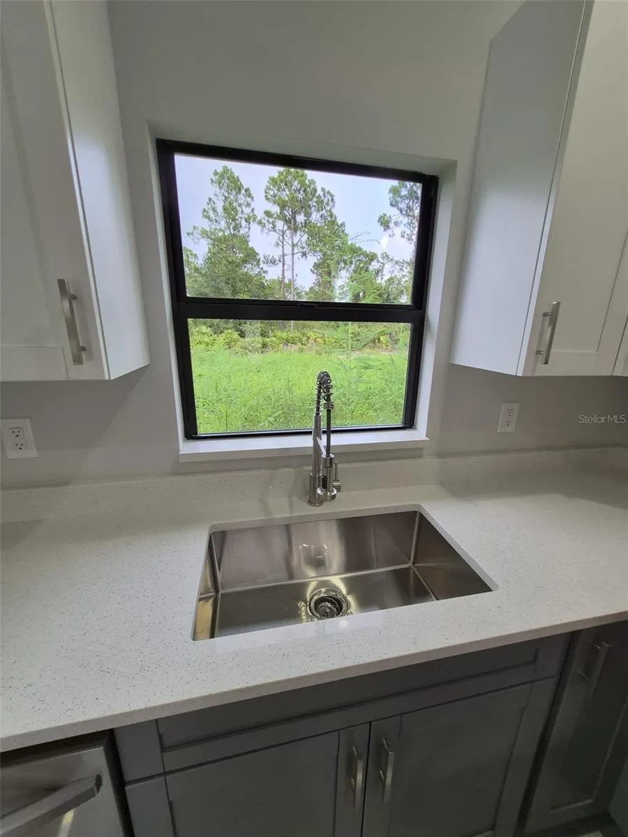 447 WICKHAM AVENUE S Lehigh Acres, FL 33974