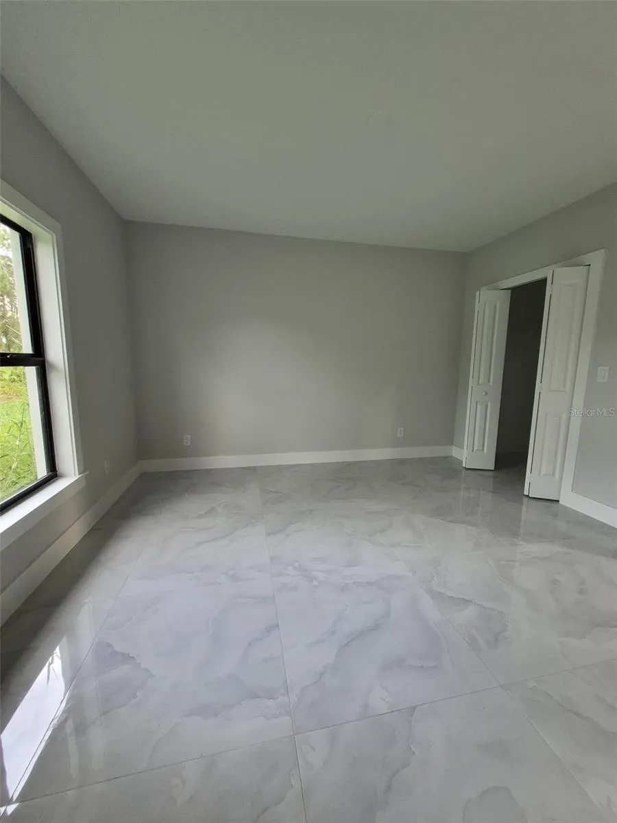 447 WICKHAM AVENUE S Lehigh Acres, FL 33974