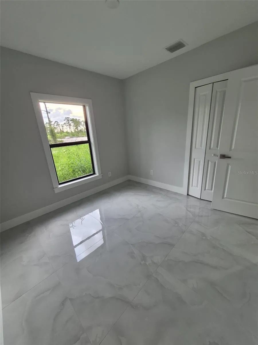 447 WICKHAM AVENUE S Lehigh Acres, FL 33974
