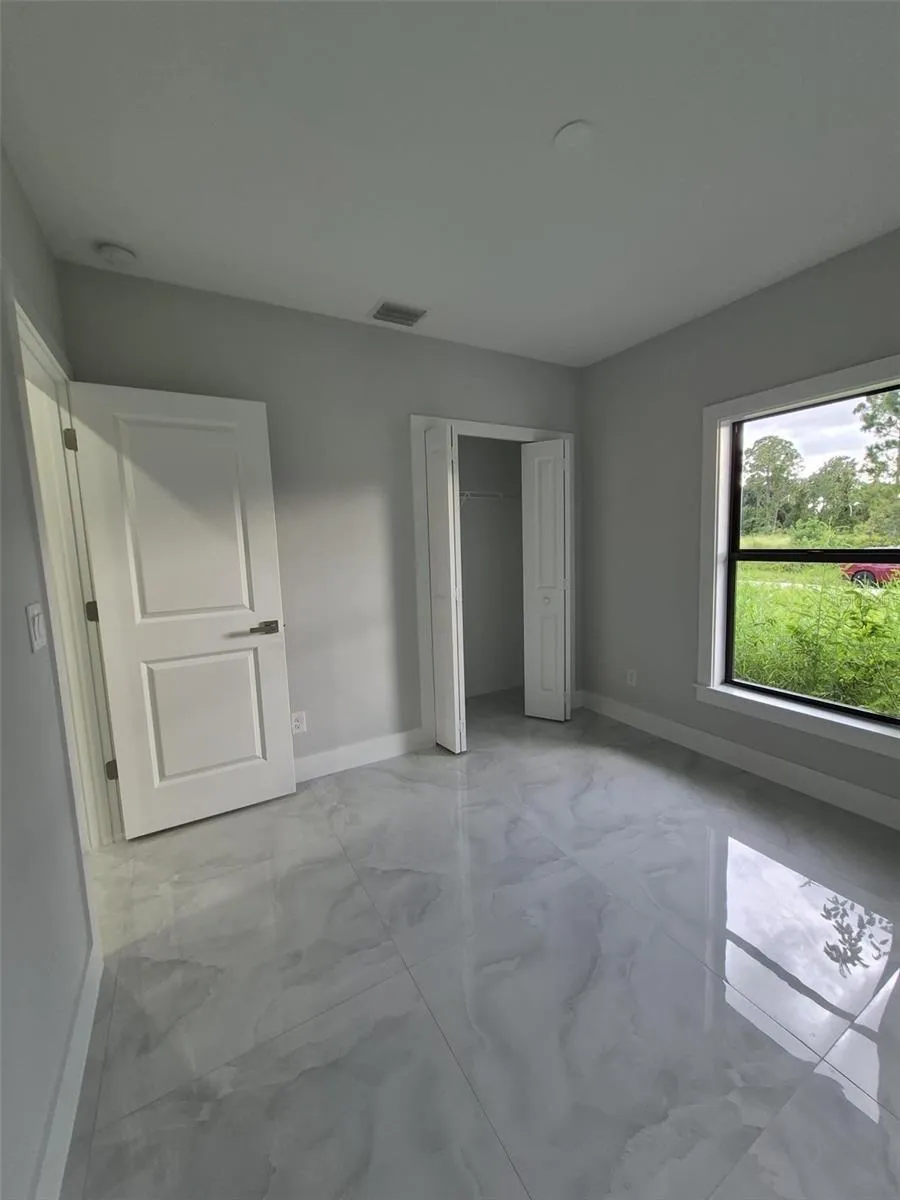 447 WICKHAM AVENUE S Lehigh Acres, FL 33974