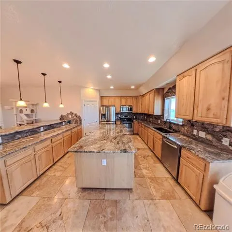 58989 E Chenango Place Strasburg, CO 80136