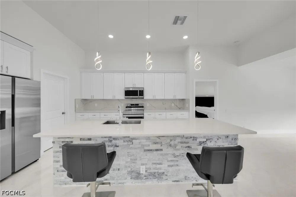 SW 34th Place Cape Coral, FL 33991