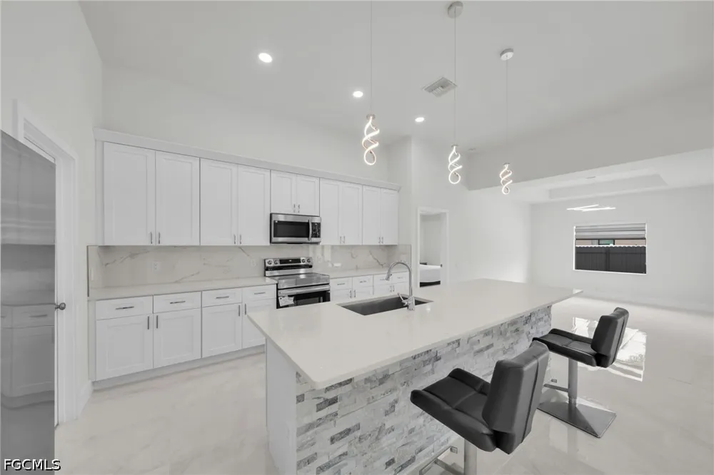 SW 34th Place Cape Coral, FL 33991
