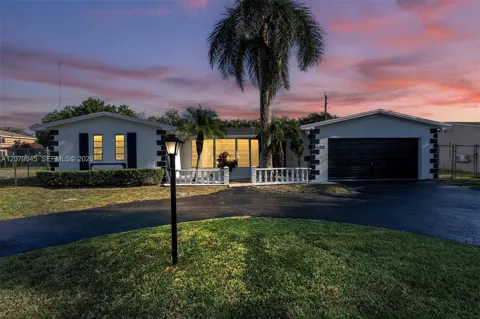860 NW 207th St