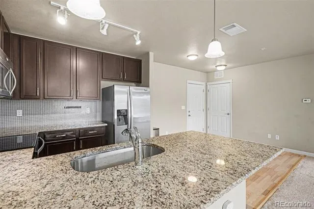 9258 Rockhurst Street #102 Highlands Ranch, CO 80129