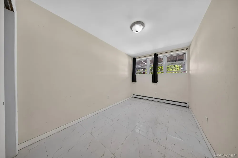 153-39 60th Avenue Flushing, NY 11355