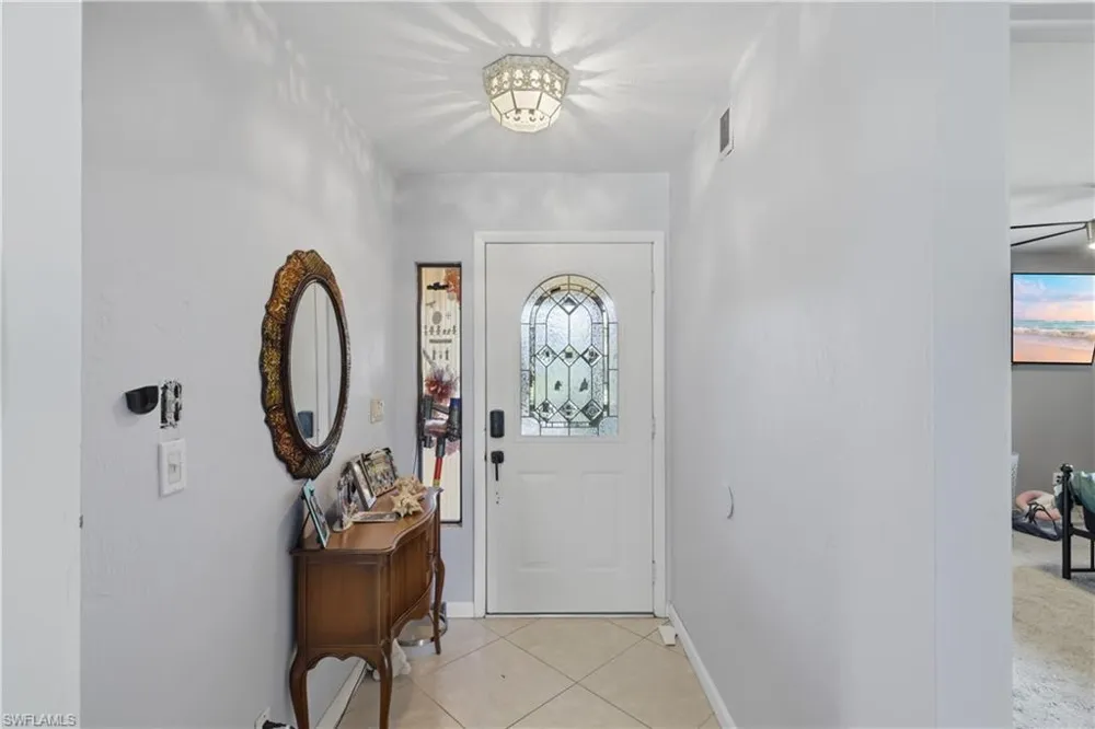 4448 Beechwood Lake Drive Naples, FL 34112